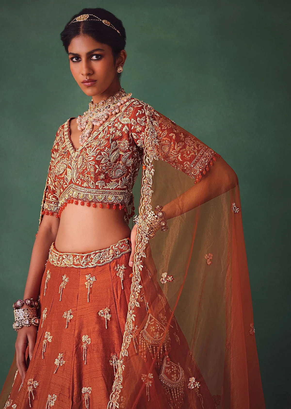 Rust Raw Silk Bridal Kali Lehenga With Embroidered Blouse And Dupatta